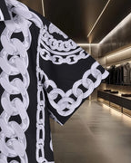 Versace black short-sleeve shirt with white chain-link trim and lace-like pattern