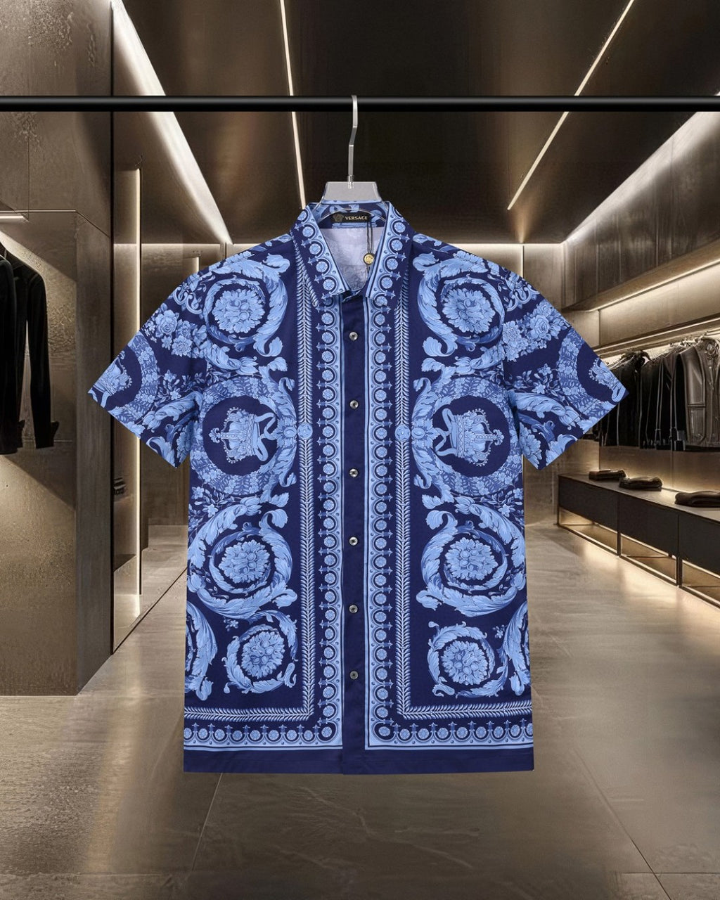 Blue short-sleeve shirt with baroque medallion print and button placket