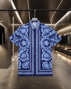 Blue short-sleeve shirt with baroque medallion print and button placket