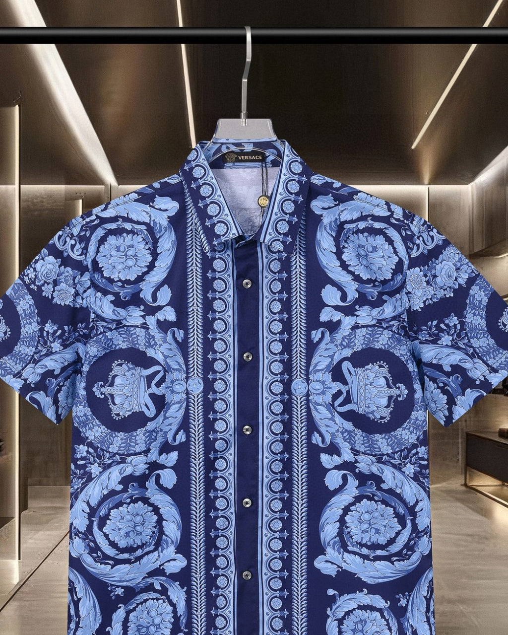 Versace blue short-sleeve shirt with bold baroque motifs and vertical center trim