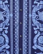 Versace blue short-sleeve shirt fabric close-up with button placket and patterned trim