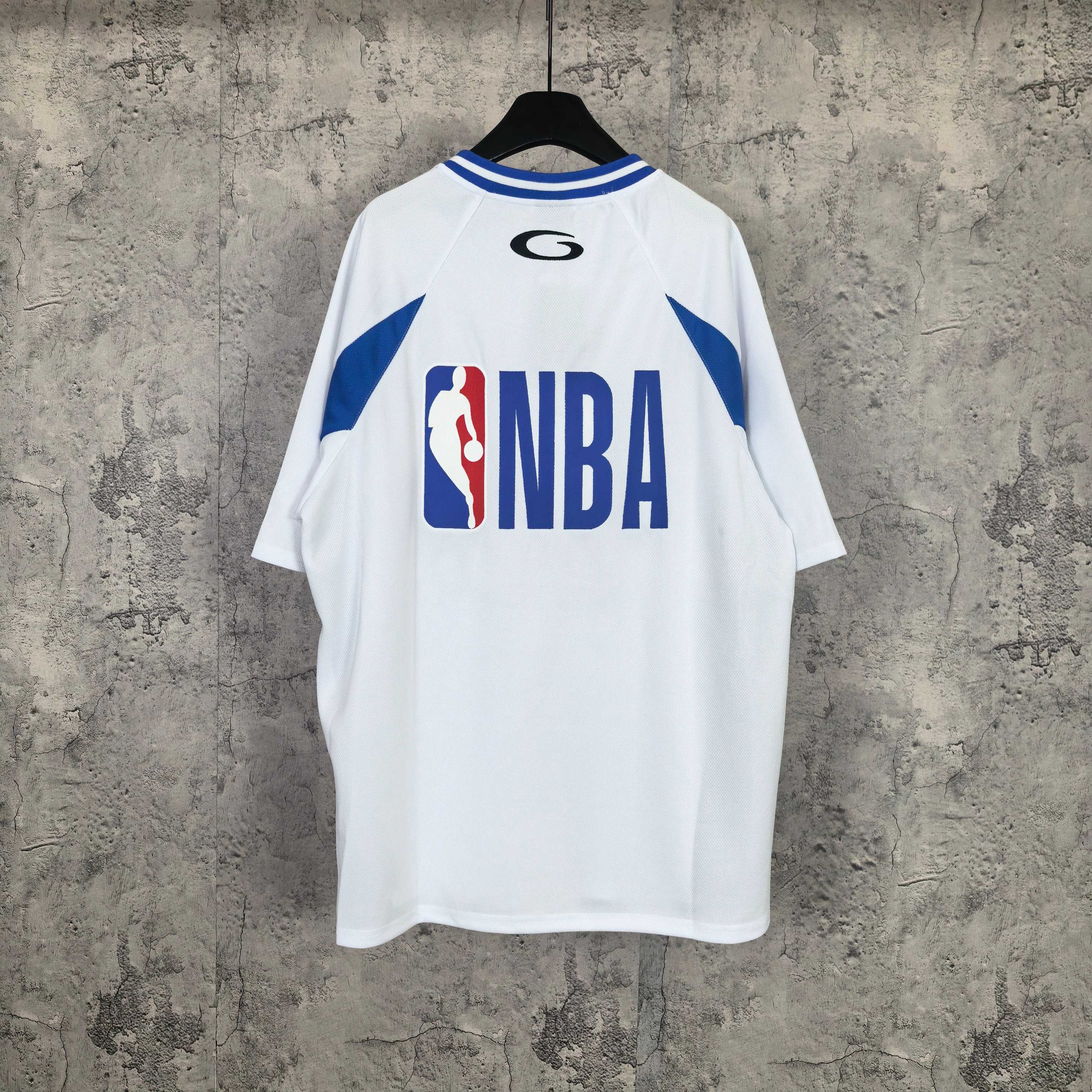 Balenciaga short-sleeve jersey, white with blue trim, “NBA” back graphic