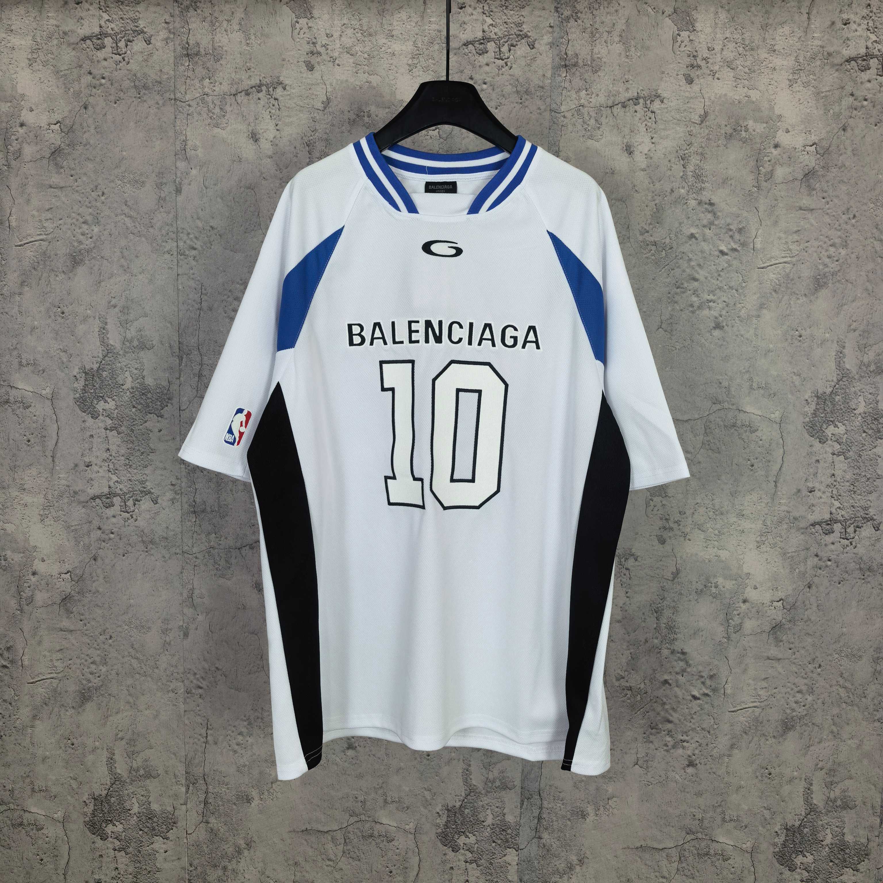 Balenciaga short-sleeve jersey, white with blue trim, black side panels, “BALENCIAGA 10” front graphic