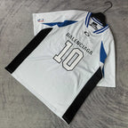 Balenciaga short-sleeve jersey laid flat, white with blue trim, “BALENCIAGA 10” front graphic