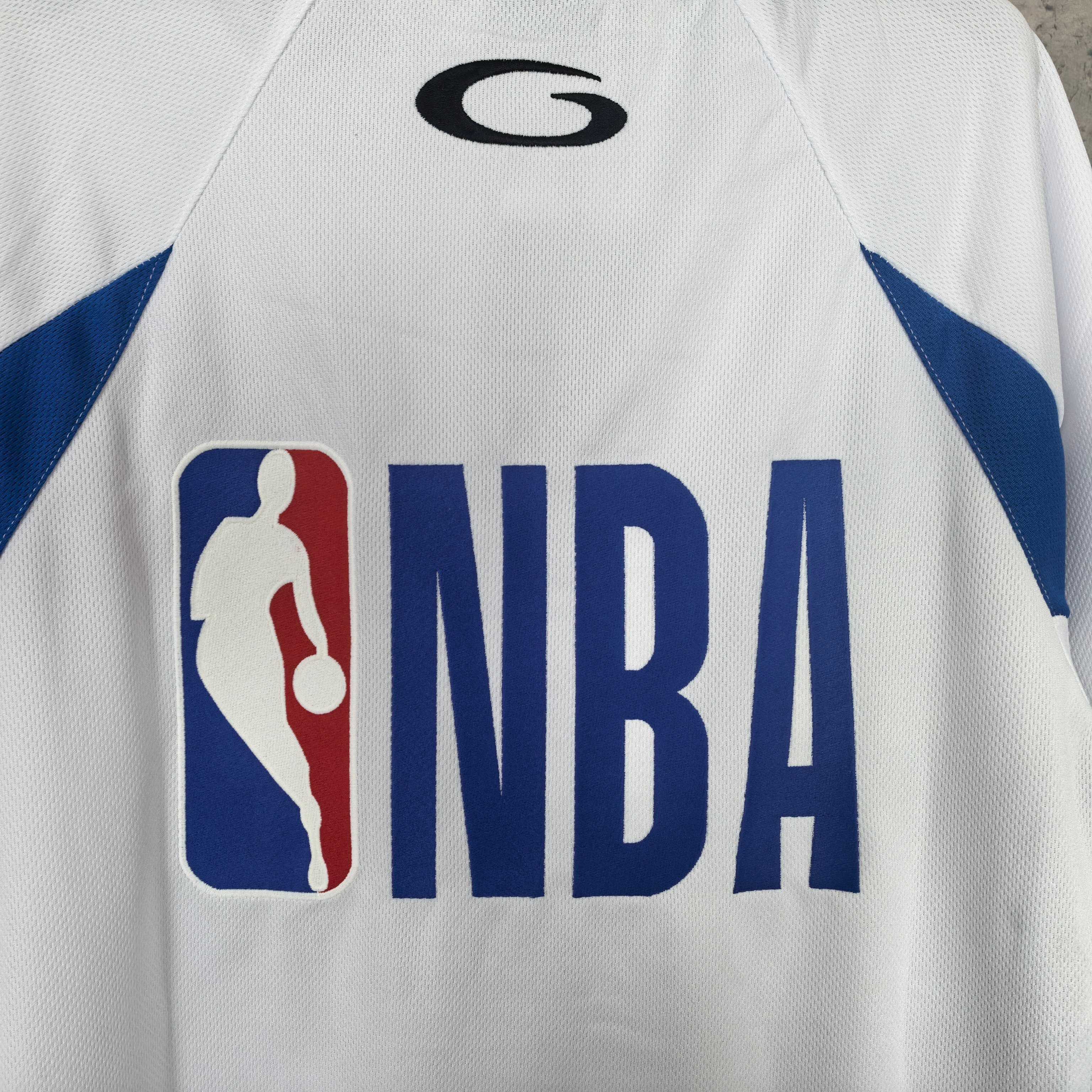 Balenciaga short-sleeve jersey close-up, “NBA” logo graphic