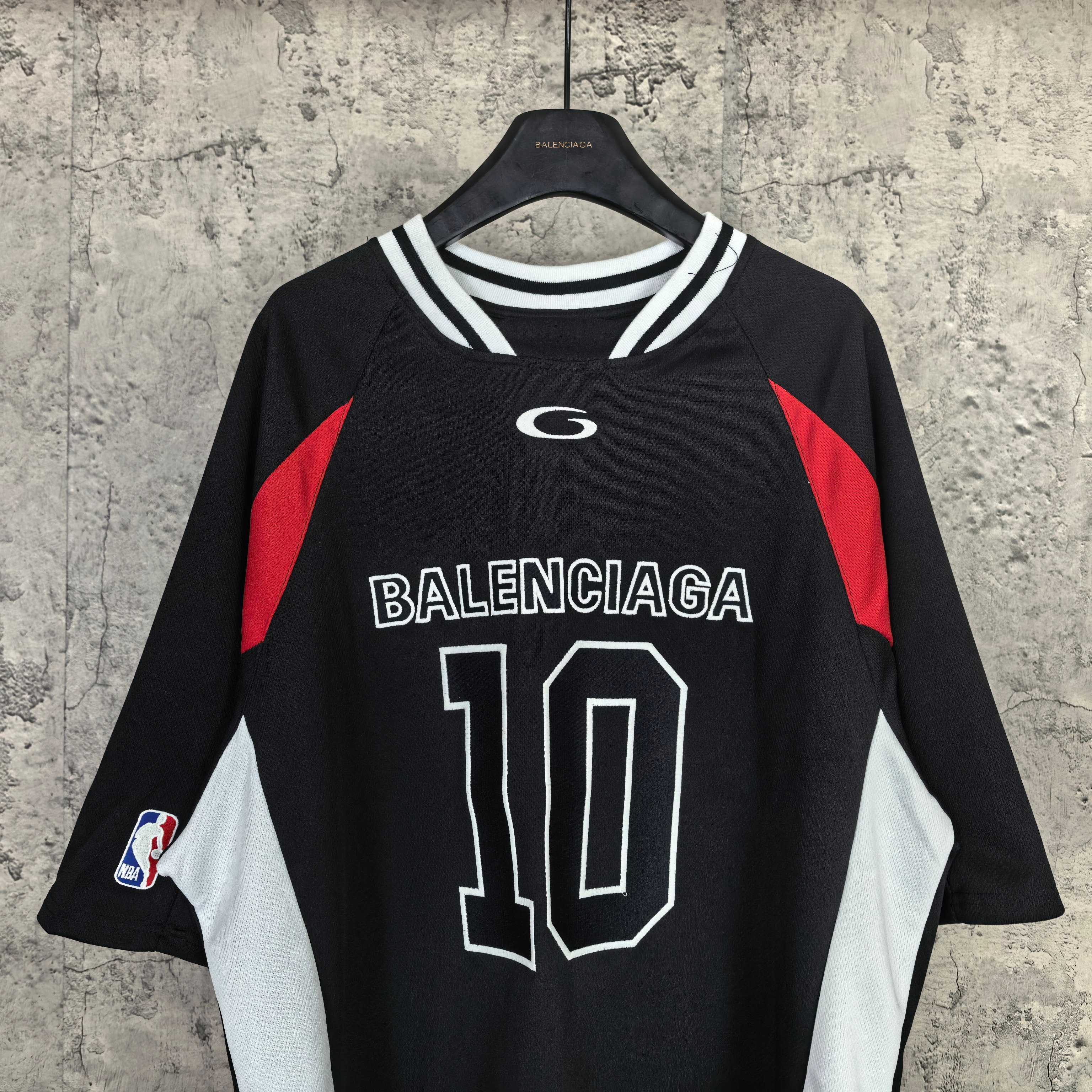 Black jersey with BALENCIAGA 10 print, white shoulder panels and red side panels