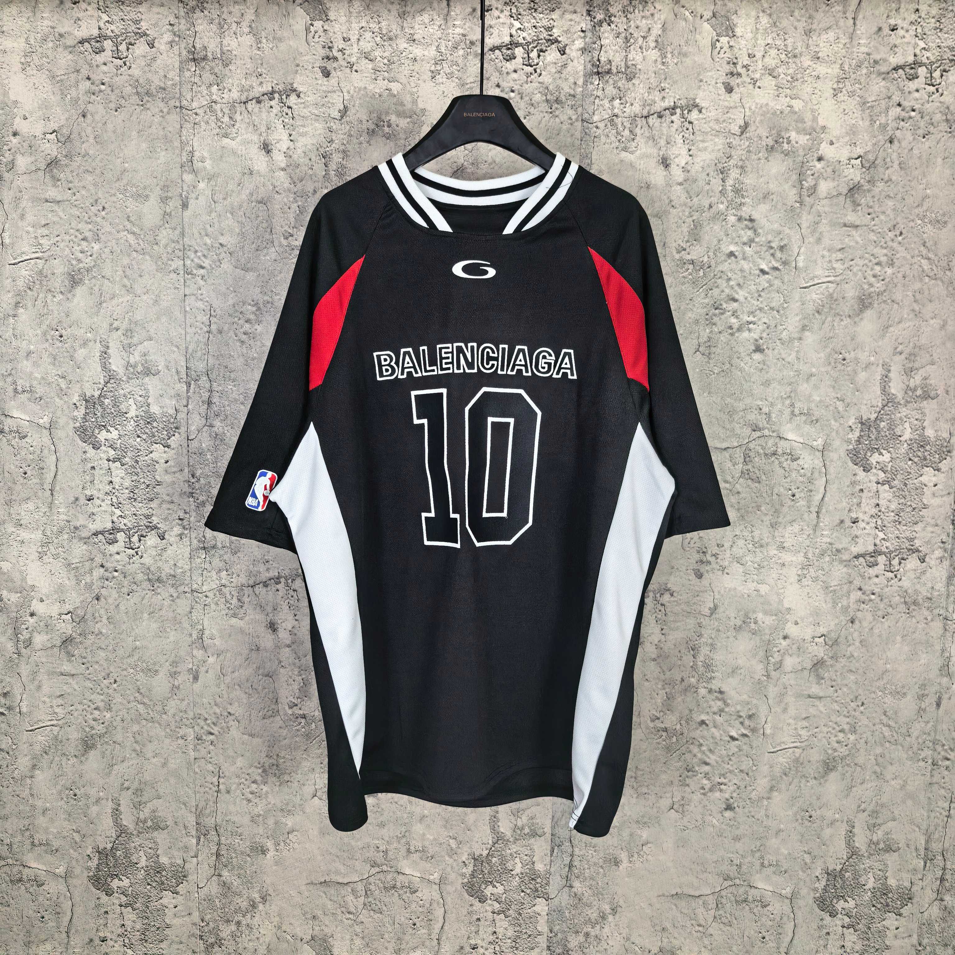 Black basketball jersey with BALENCIAGA 10 graphic, red accents and striped collar