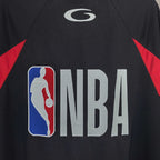 Black jersey close-up with NBA logo and red side triangle accents