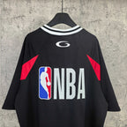 Black basketball jersey with NBA logo, red shoulder panels and striped collar trim