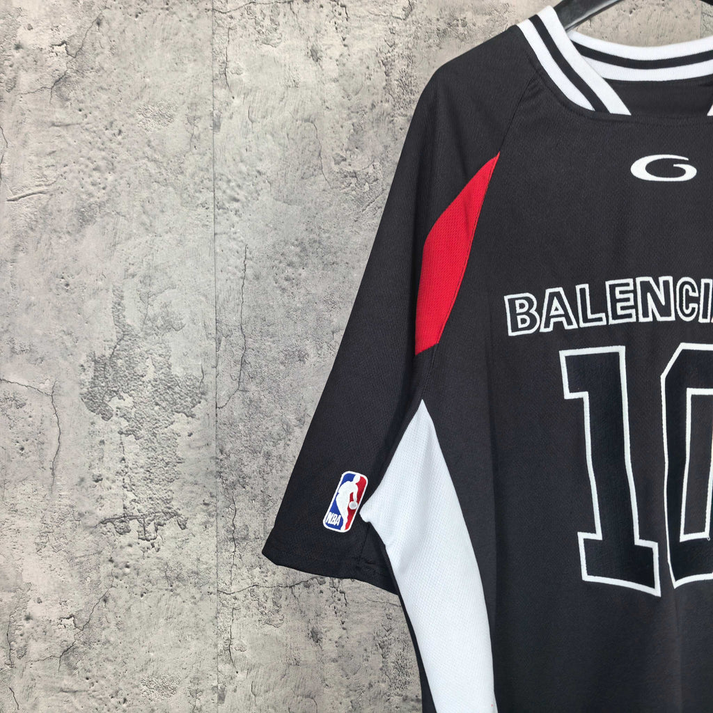 Black jersey side view with BALENCIAGA 10 print and white sleeve panel