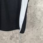 Balenciaga long-sleeve shirt with white side panel and curved hem