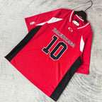 Red short-sleeve jersey laid flat with BALENCIAGA 10 front print and black side panels