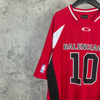 Red short-sleeve jersey angled on hanger with BALENCIAGA 10 front print