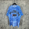 Blue short-sleeve graphic T-shirt with Balenciaga and NBA logo on chest.