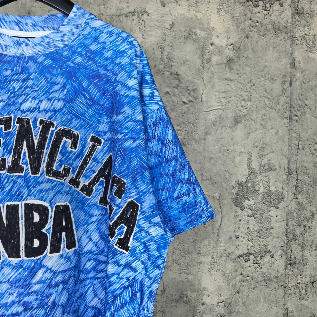 Blue Balenciaga NBA graphic T-shirt sleeve with part of front logo print