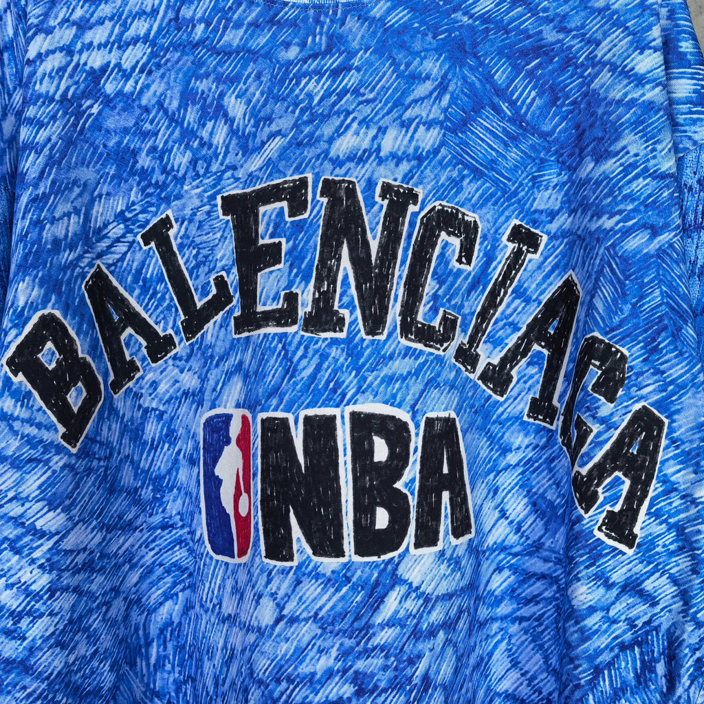 Balenciaga NBA T-shirt print close-up in blue with BALENCIAGA text and NBA logo
