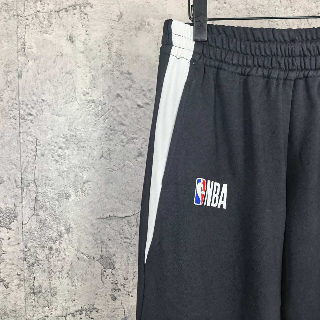 Black drawstring pants with NBA patch logo