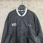 Black varsity bomber jacket with white-trim V-neck collar and NBA patch
