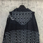 Balenciaga zip-up hoodie back view, black with repeating BALENCIAGA text across shoulders
