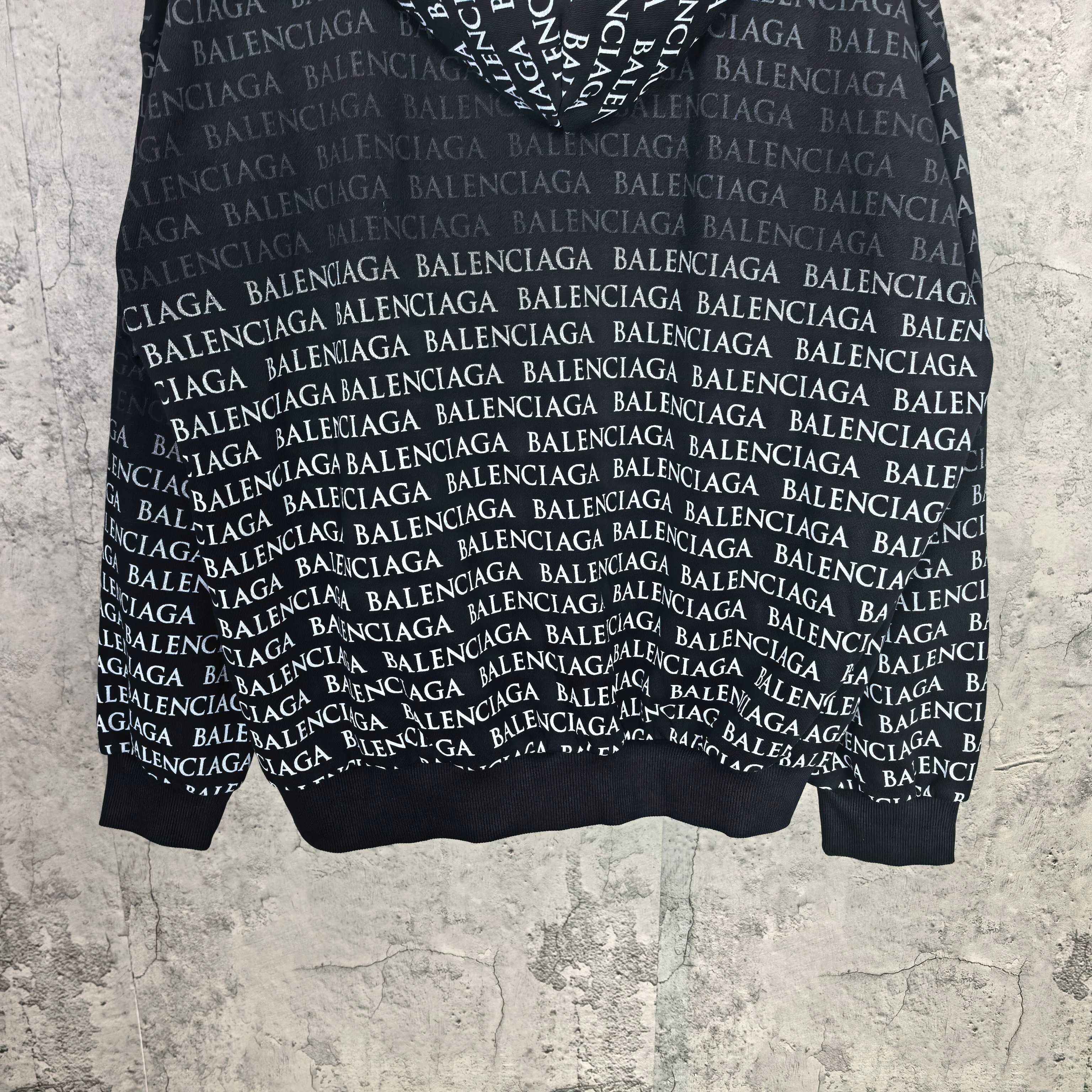 Balenciaga long-sleeve hoodie with allover logo print and hood