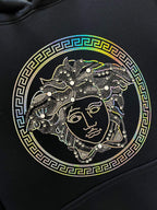 Versace Medusa face graphic on dark navy hoodie with Greek key border