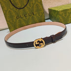 Gucci belt, dark leather with gold-tone GG buckle and center hole row