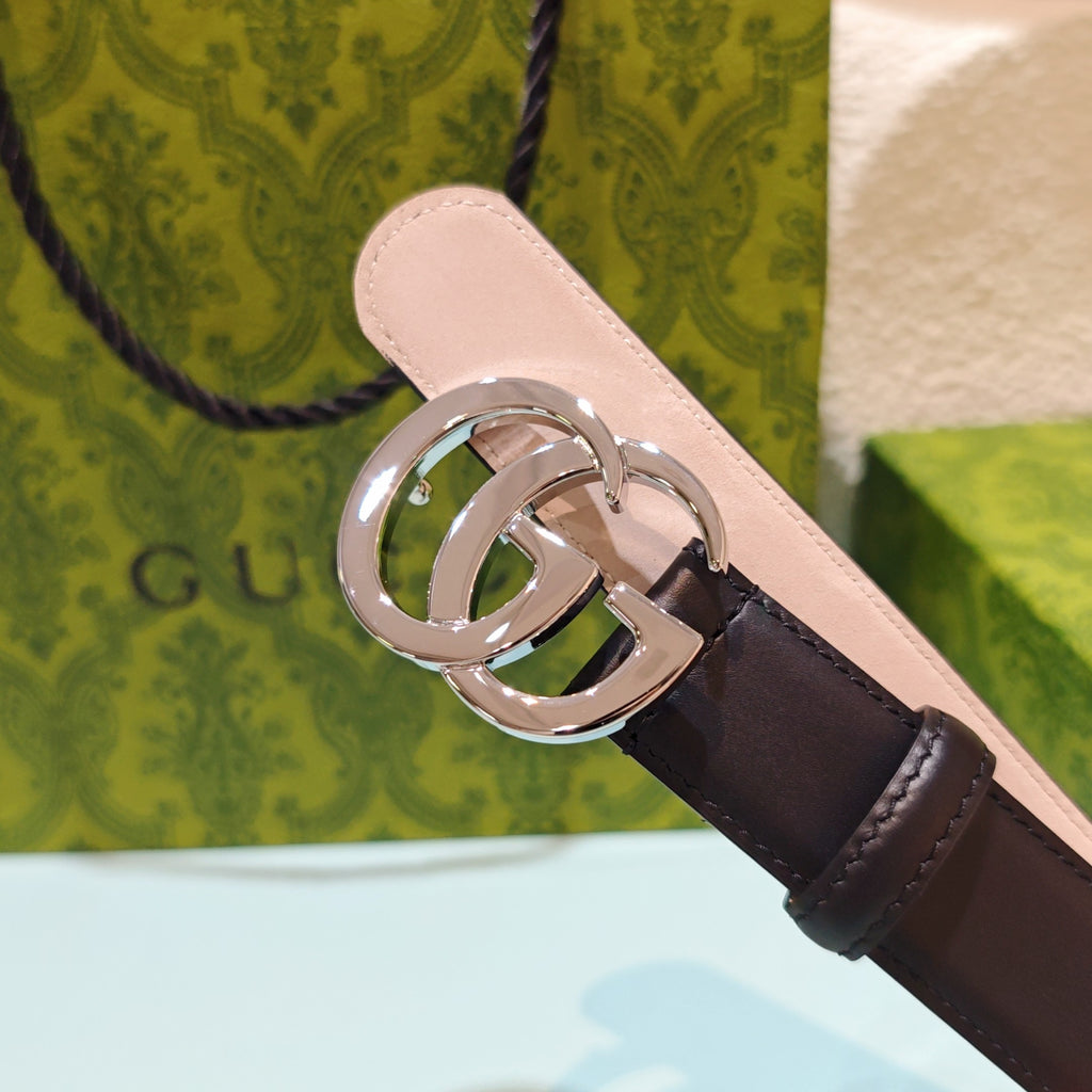 Two-tone belt: dark brown exterior with silver double-G buckle