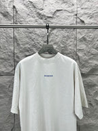 White short-sleeve T-shirt with small Balenciaga logo on front