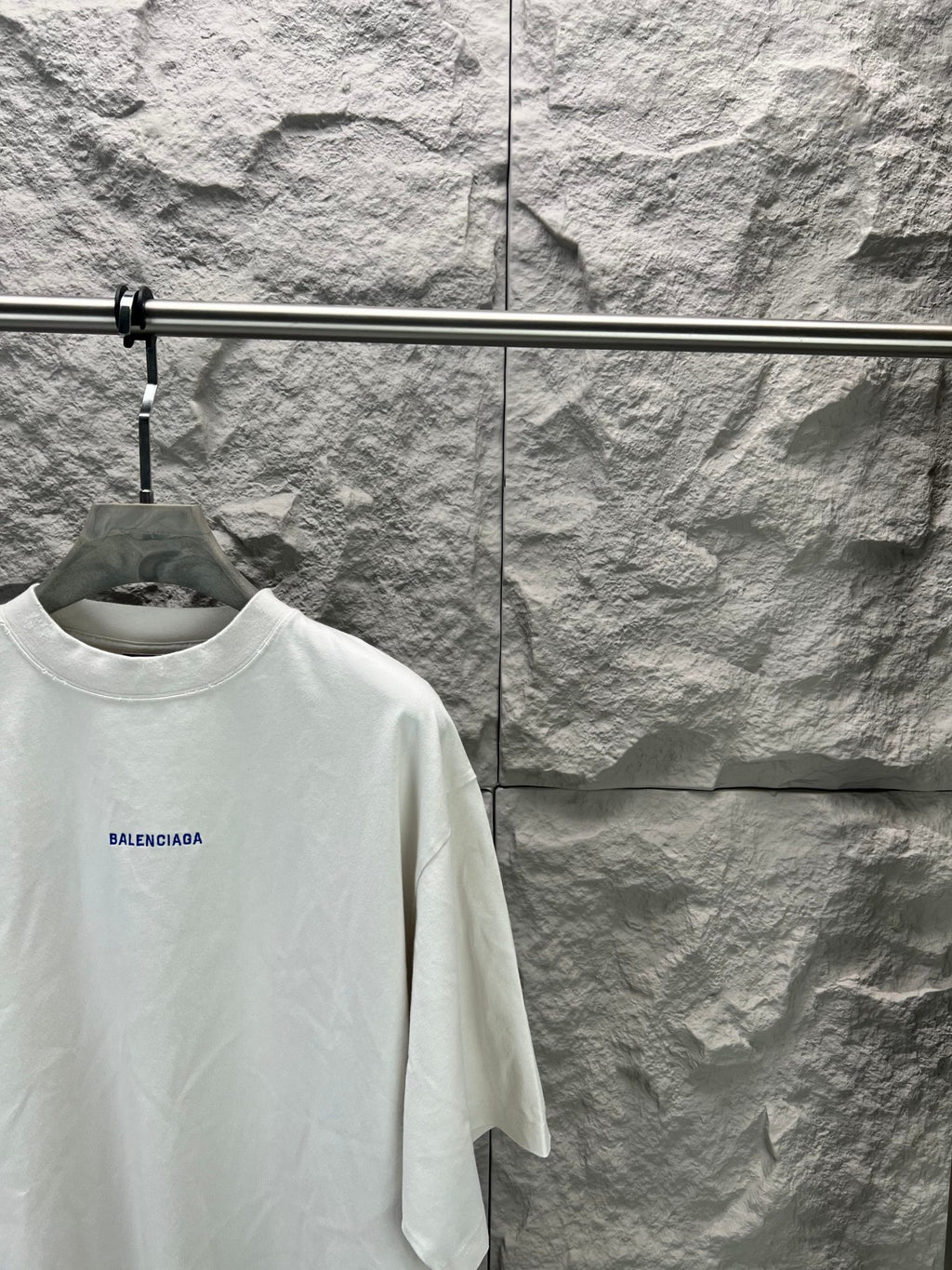 White short-sleeve T-shirt with small Balenciaga logo, crew neck