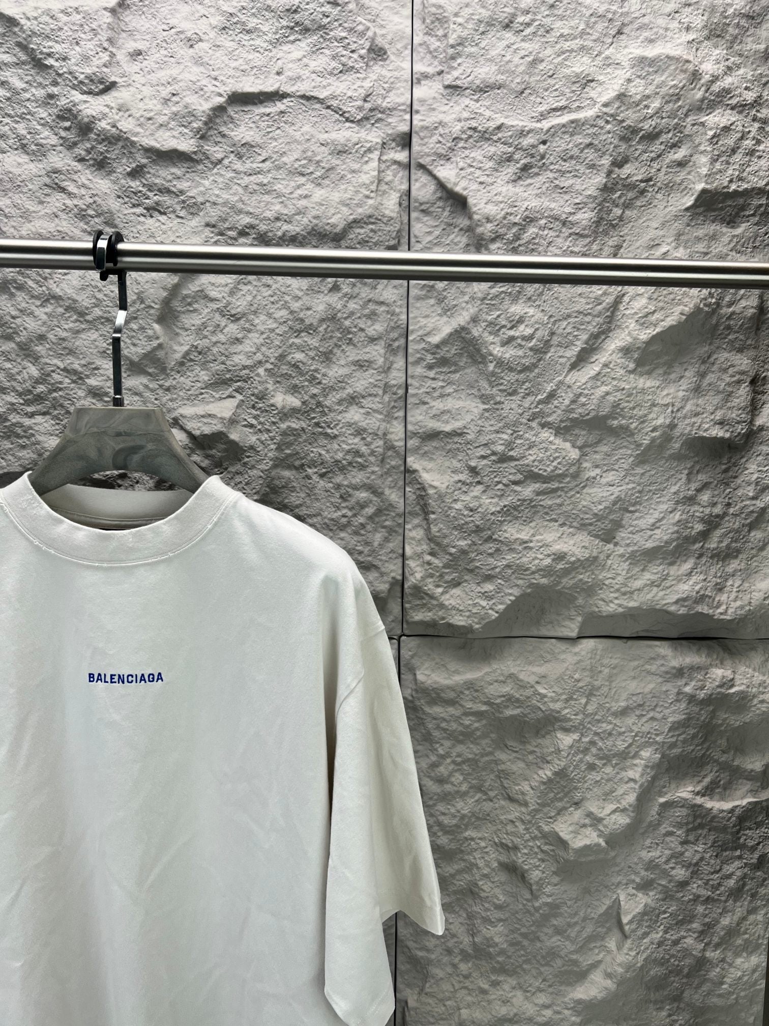 White short-sleeve T-shirt with small Balenciaga logo, crew neck