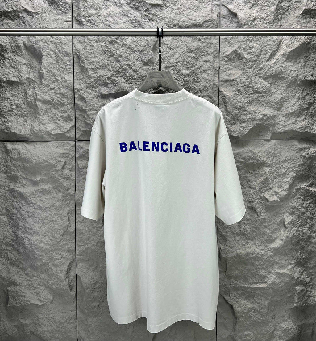 White short-sleeve T-shirt with blue Balenciaga logo on back