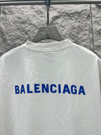 White T-shirt back with large blue Balenciaga lettering
