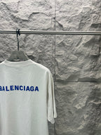 White T-shirt back with partial blue Balenciaga logo, relaxed fit