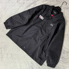 Dark navy jacket laid flat with button placket, spread collar, NBA patch and G logo