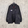 Dark navy long-sleeve jacket with button front, spread collar, NBA patch and logo