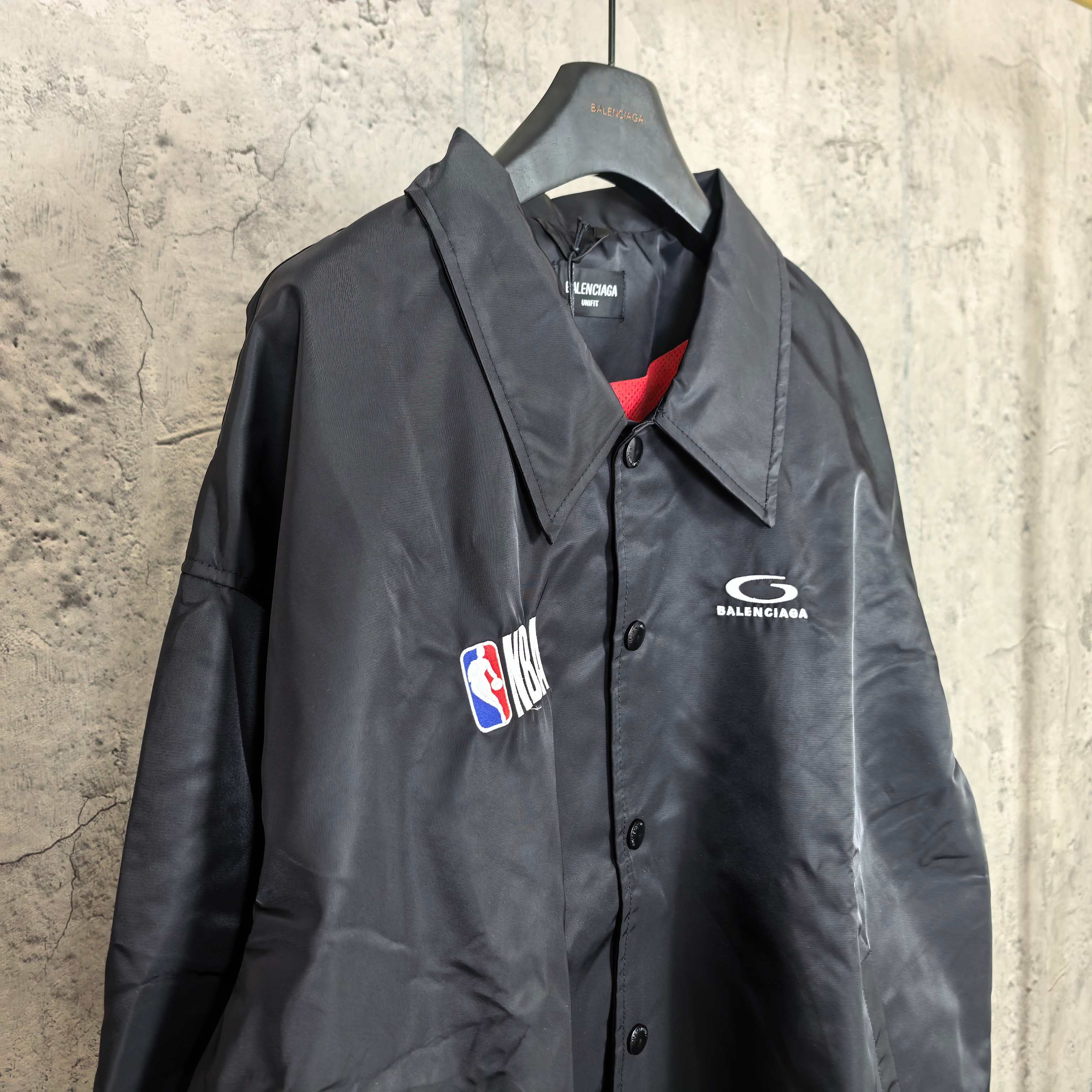 Dark navy jacket with spread collar, button front, NBA patch and Balenciaga logo