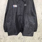 Dark navy short jacket front with button placket and elastic cuffs