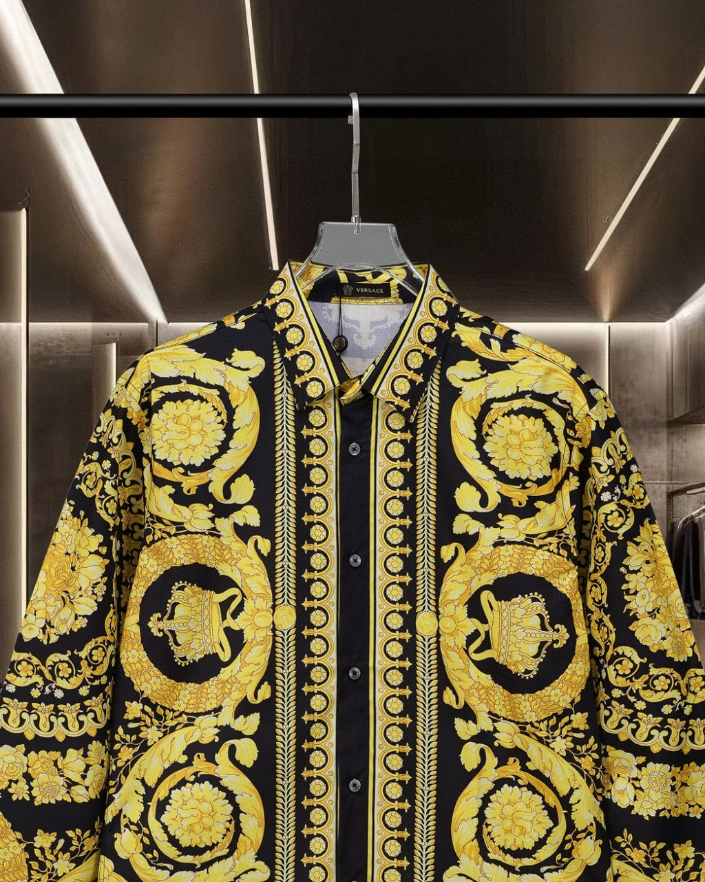 Versace button-up shirt front, gold ornate motifs on black with dark button placket