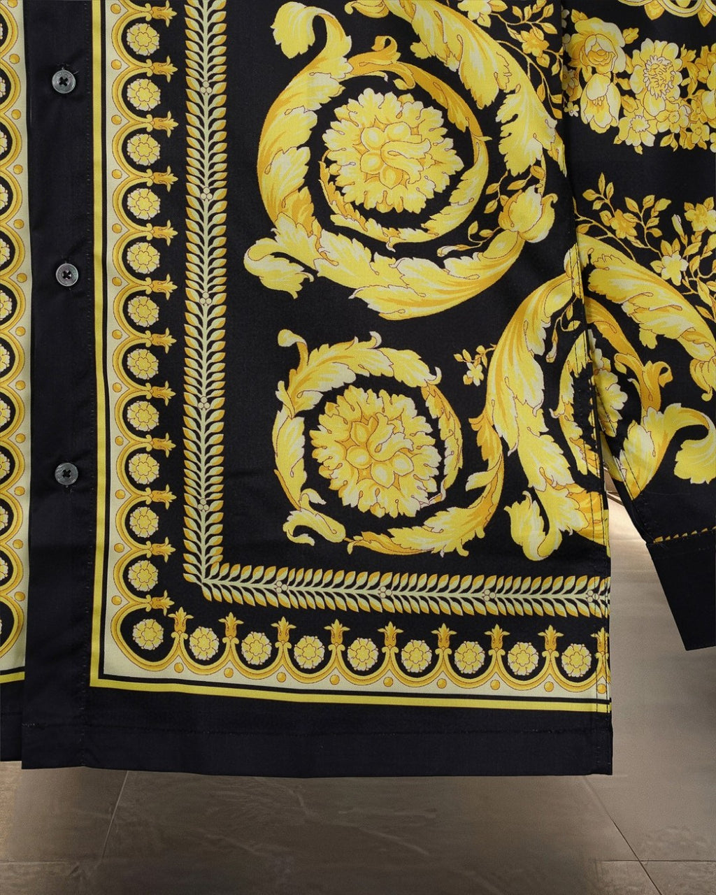 Versace shirt hem panel, black with gold medallion motif and decorative border
