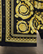 Versace shirt hem panel, black with gold medallion motif and decorative border