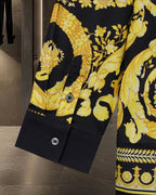 Button-up shirt with black base and yellow baroque floral print, long sleeves