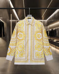 Versace button-up shirt with yellow baroque print, white placket, pointed collar