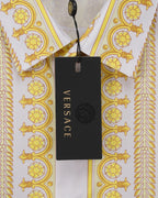 Versace shirt hanging tag on collar placket; yellow baroque print on white fabric