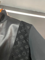 Louis Vuitton monogram patch on black jacket sleeve panel