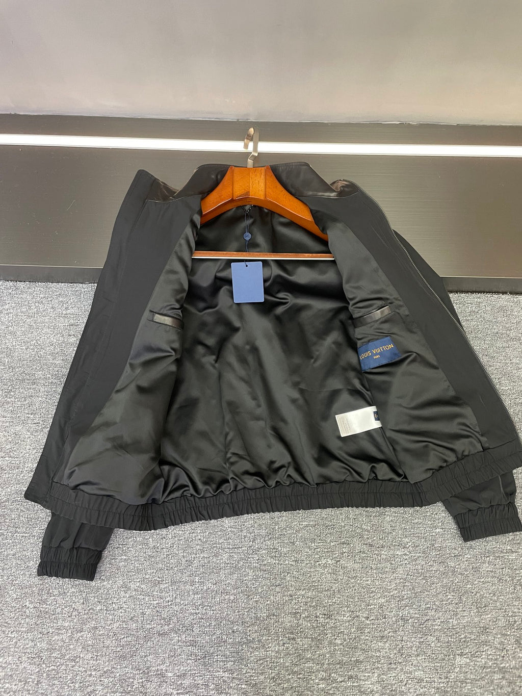 Jacket interior lining, black, with pocket and size tag