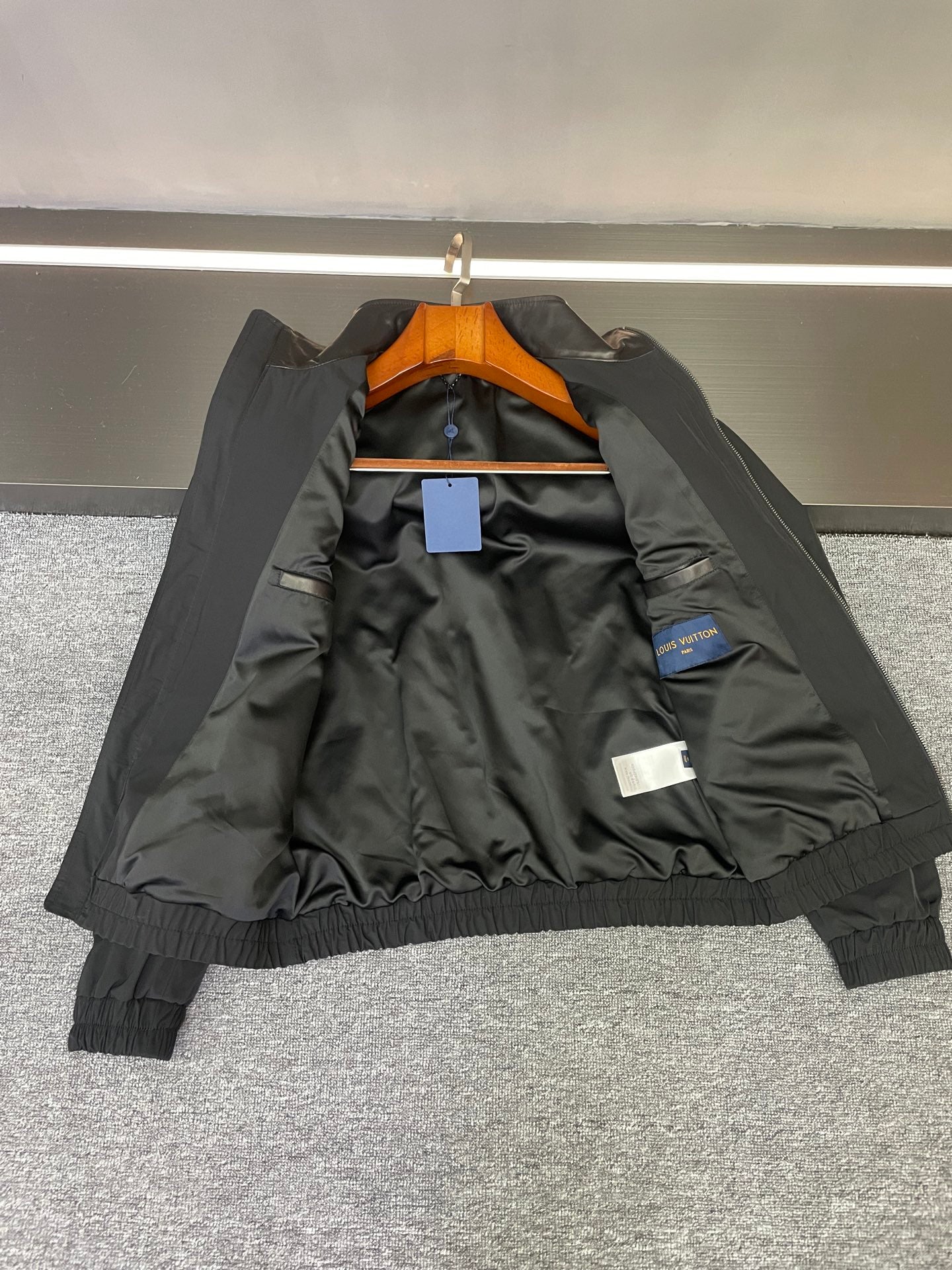 Jacket interior lining, black, with pocket and size tag