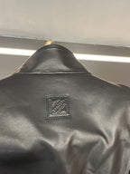 Back logo label patch on black Louis Vuitton jacket