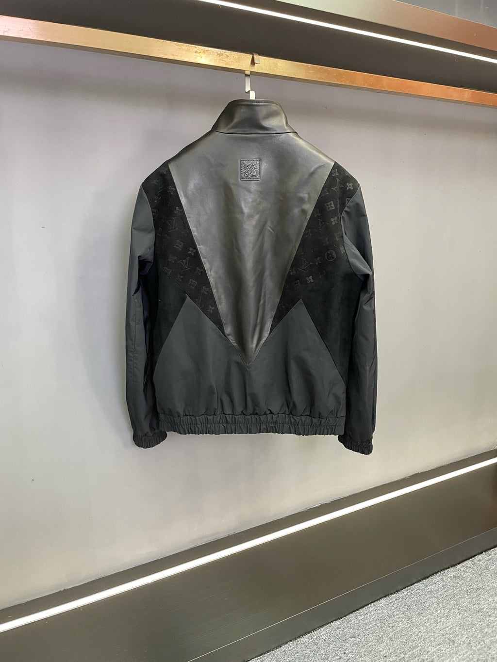 Louis Vuitton monogram windbreaker jacket, dark gray, back view with seam detail