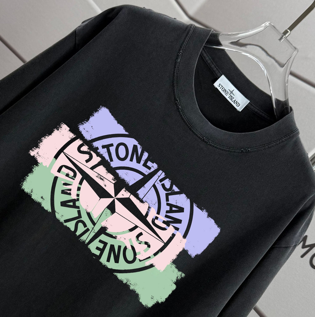 Black T-shirt front logo graphic close-up
