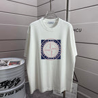 White T-shirt with large circular Stone Island-style graphic on the front